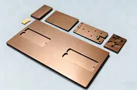 Diamond-copper thermal composite plates with holes and machined features
