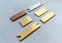 Thermal composite parts with custom outlines, holes and slots